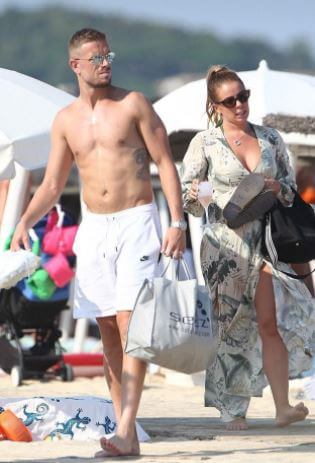 Elexa Henderson's parents, Jordan Henderson and Rebecca Burnett, enjoying France beach.